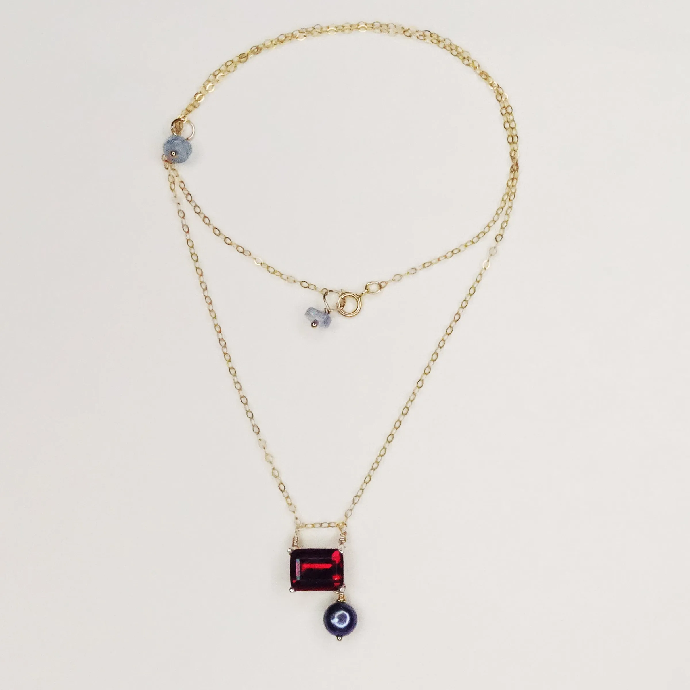 Brave, Eloquent Amanda: garnet, gold, pearl necklace