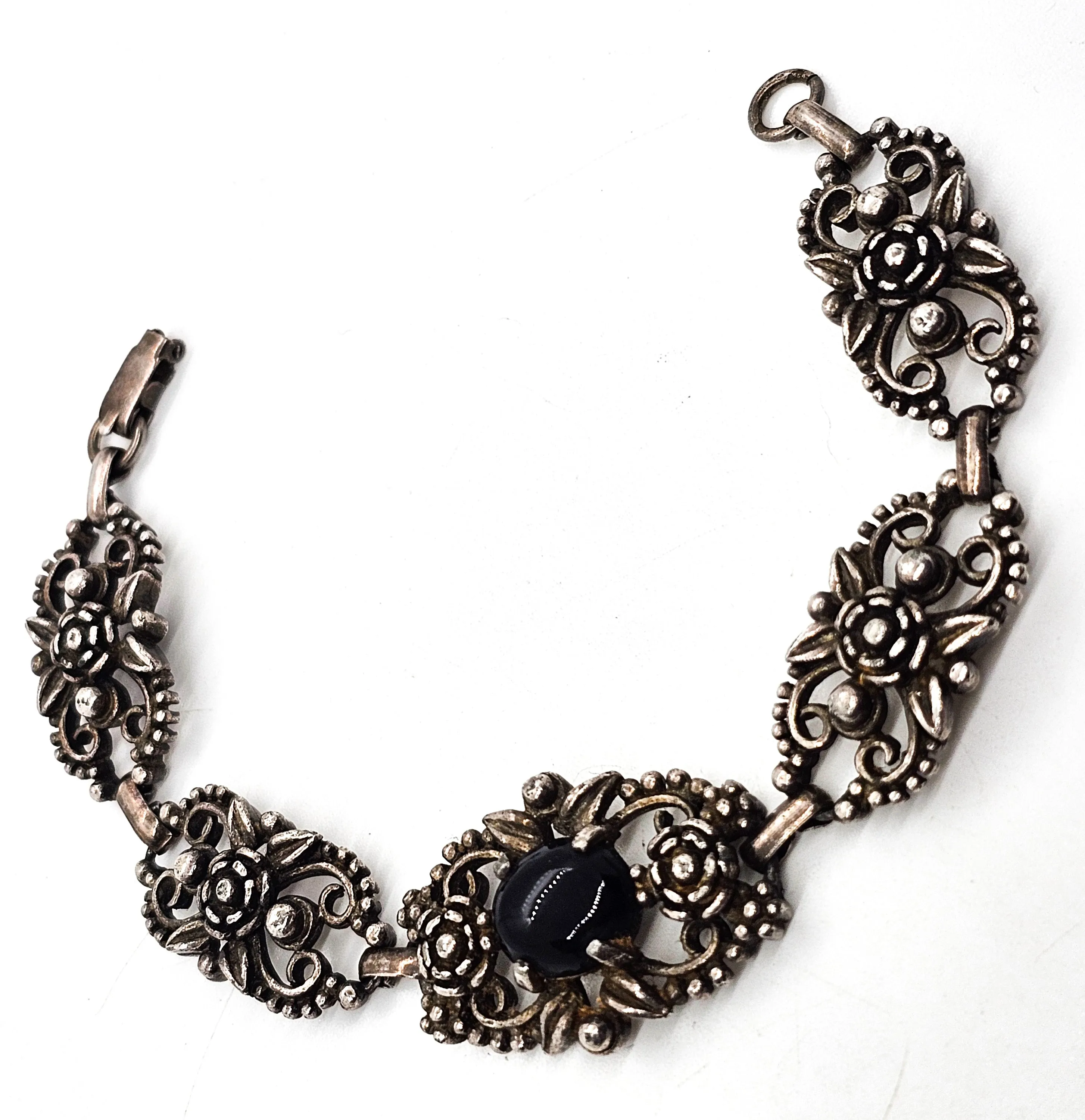 Filigree open work floral vintage panel bracelet with black stone accent