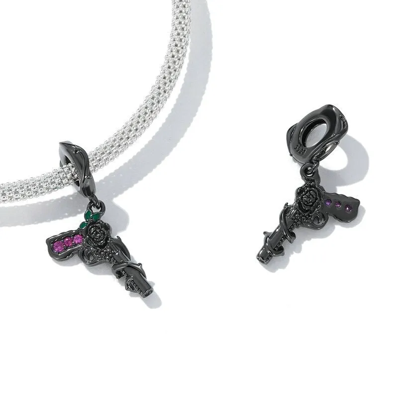 Vintage Black Rose Pistol & Butterfly Charm