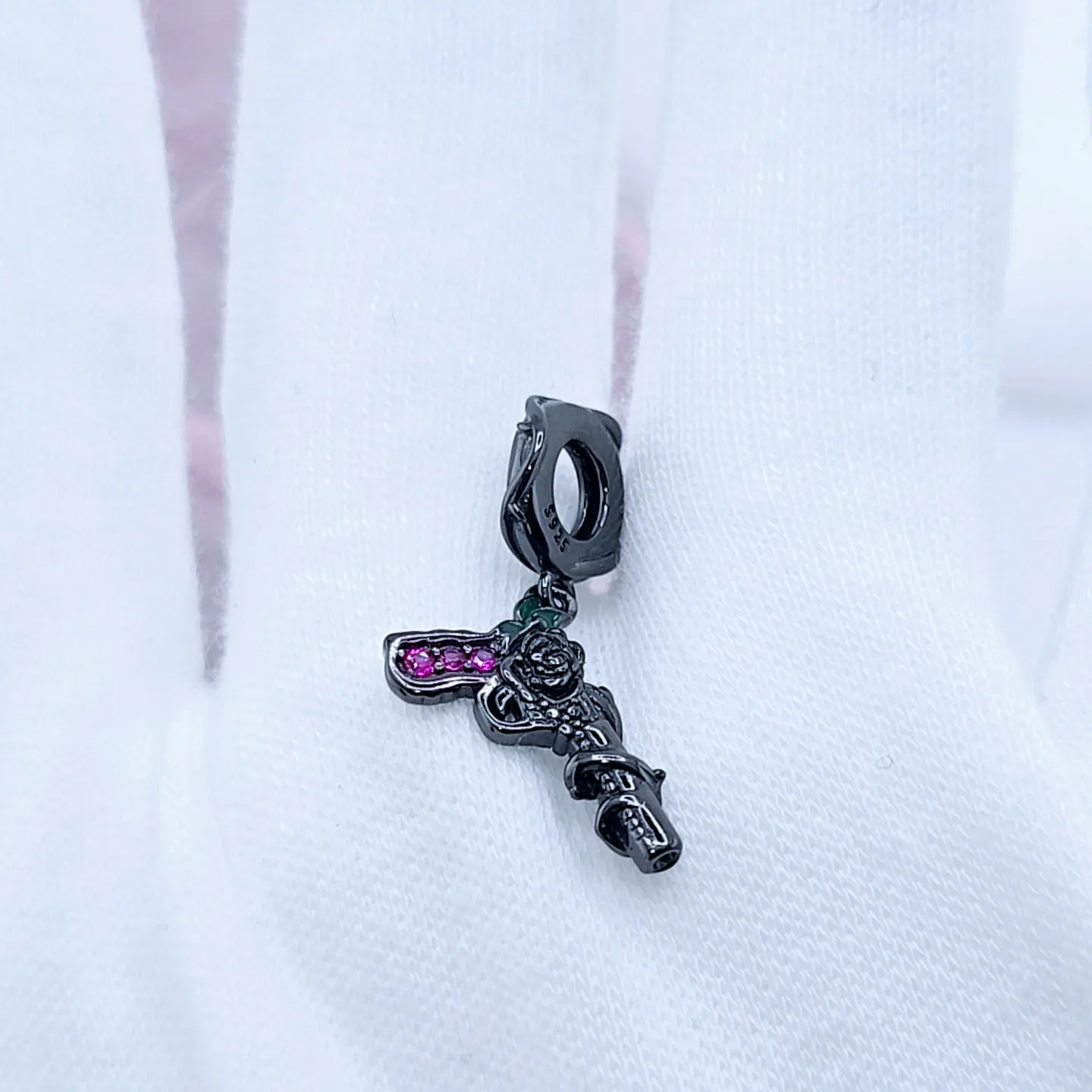 Vintage Black Rose Pistol & Butterfly Charm