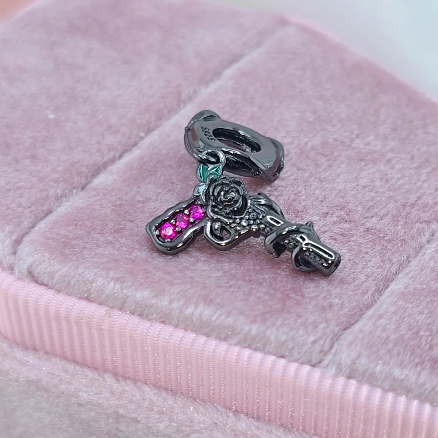 Vintage Black Rose Pistol & Butterfly Charm