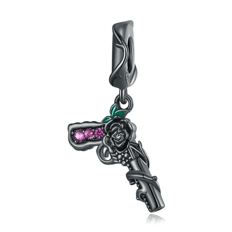 Vintage Black Rose Pistol & Butterfly Charm