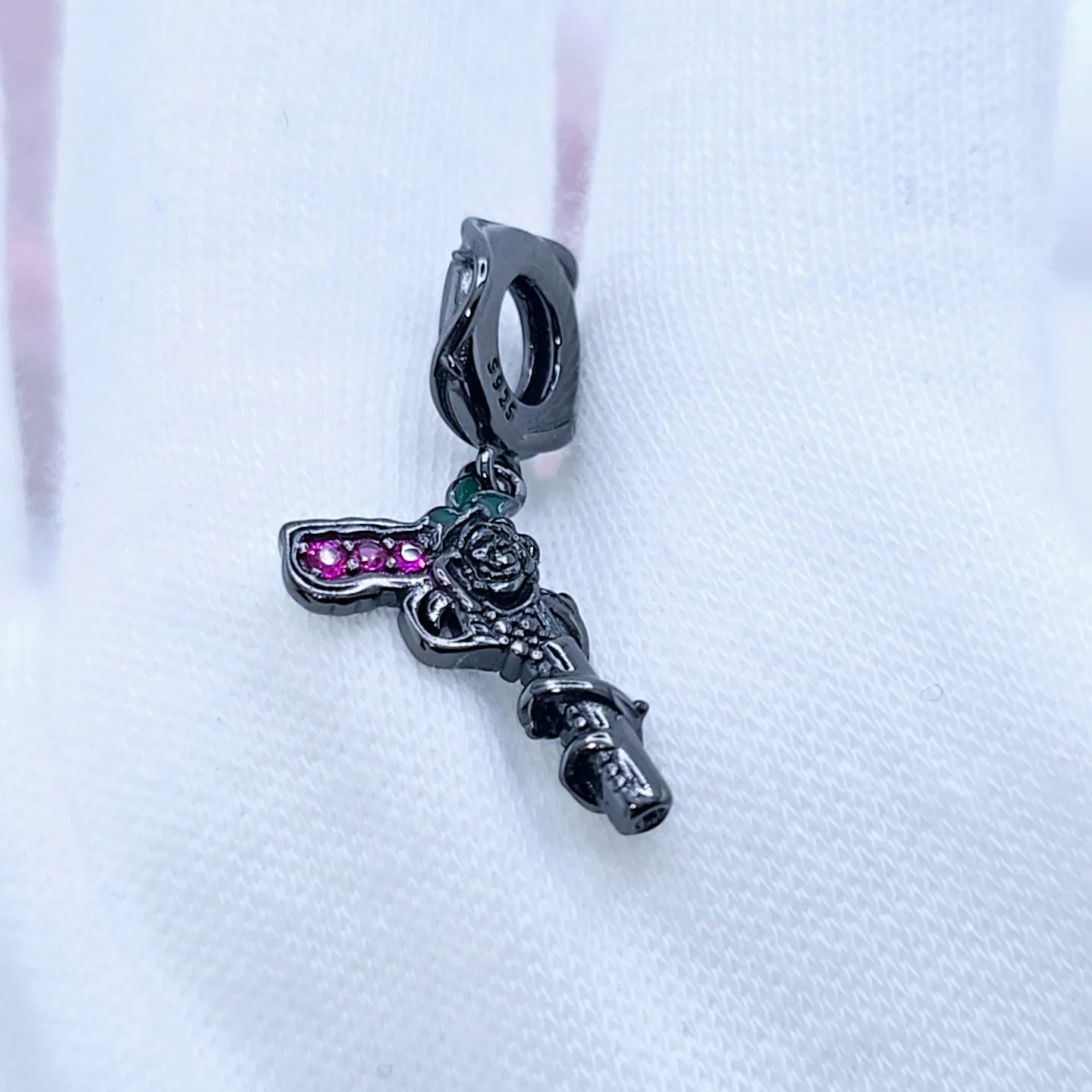 Vintage Black Rose Pistol & Butterfly Charm